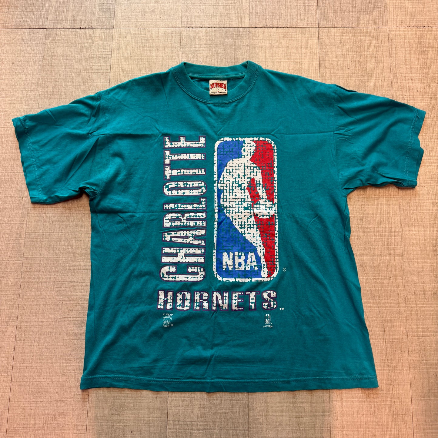 Charlotte Hornets Big Jerry West Logo Nutmeg Tee
